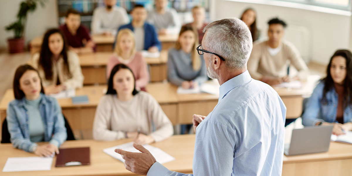 Professor teaching history in classroom